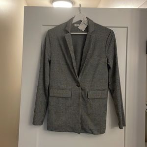 Checkered blazer, slightly oversized.